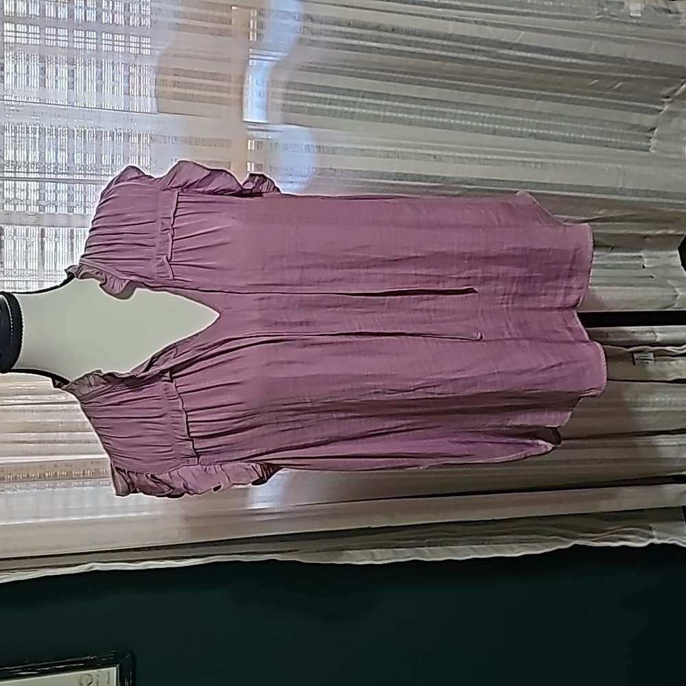 Purple sleeveless blouse